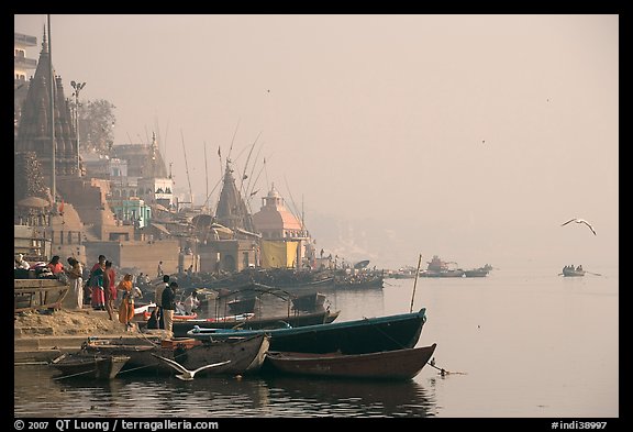 Temples and Ganga River, foggy sunrise. Varanasi, Uttar Pradesh, India (color)