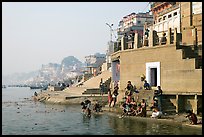 Men dipping in Ganga River at Meer Ghat. Varanasi, Uttar Pradesh, India