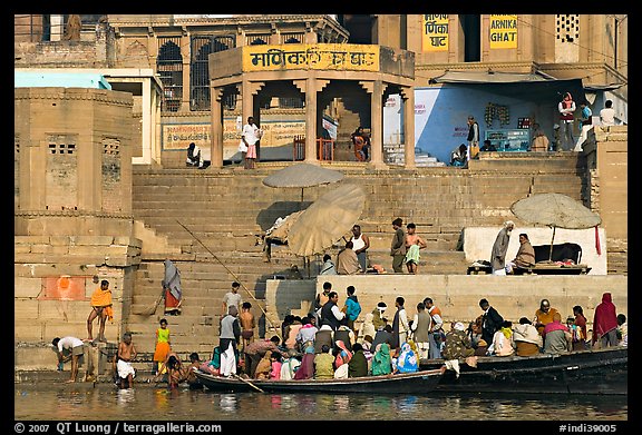 Boats loaded with pilgrims and steps, Manikarnika Ghat. Varanasi, Uttar Pradesh, India (color)