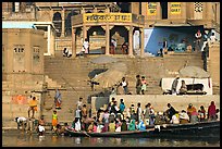 Boats loaded with pilgrims and steps, Manikarnika Ghat. Varanasi, Uttar Pradesh, India