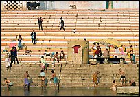 Men finishing their bath below the steps of Scindhia Ghat. Varanasi, Uttar Pradesh, India (color)