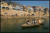 Rowboat in front of Scindhia Ghat. Varanasi, Uttar Pradesh, India