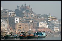 Alamgir Mosque above boats and the Ganges River. Varanasi, Uttar Pradesh, India (color)