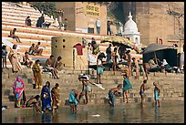 Hindu people on the steps of Sankatha Ghat. Varanasi, Uttar Pradesh, India (color)