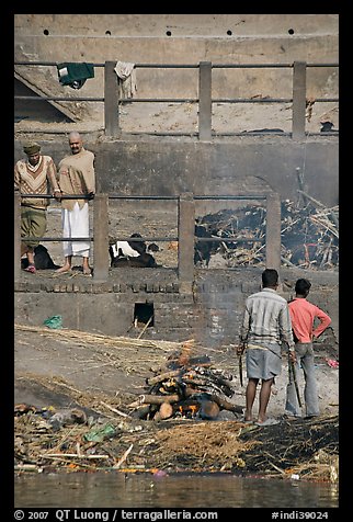 Men attending to cremation, Manikarnika Ghat. Varanasi, Uttar Pradesh, India