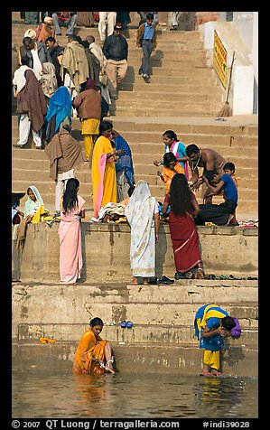 Women rinsing in river Ganges water. Varanasi, Uttar Pradesh, India (color)