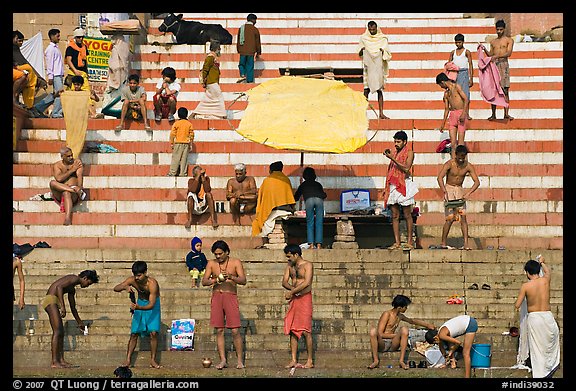 Men after bath on steps of Meer Ghat. Varanasi, Uttar Pradesh, India (color)