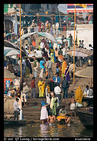 Colorful crowd on steps of Dasaswamedh Ghat. Varanasi, Uttar Pradesh, India (color)