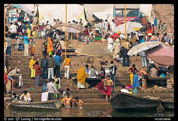 Ganga riverside activity on steps of Dasaswamedh Ghat. Varanasi, Uttar Pradesh, India