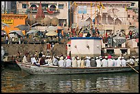 Boat packed with men near Dasaswamedh Ghat. Varanasi, Uttar Pradesh, India ( color)