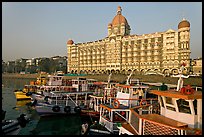 Tour boats and Taj Mahal Palace Hotel. Mumbai, Maharashtra, India (color)