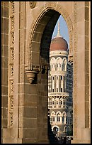 Taj Mahal Palace Hotel seen through arch of Gateway of India. Mumbai, Maharashtra, India