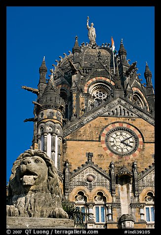 Lion and Gothic tower topped by 4m-high statue of Progress, Victoria Terminus. Mumbai, Maharashtra, India