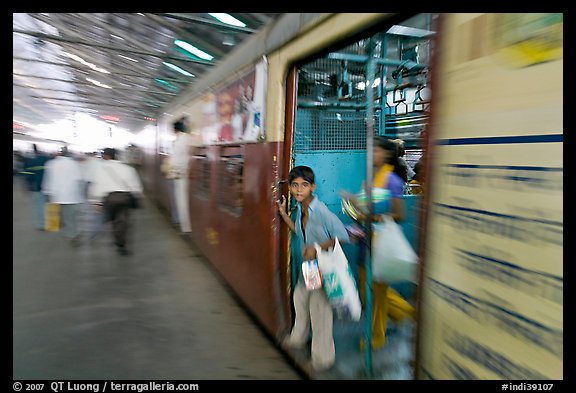 View of departing train with motion blur. Mumbai, Maharashtra, India (color)