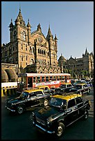 Black and Yellow cabs in front of Victoria Terminus. Mumbai, Maharashtra, India