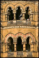 Facade with woman at window, Chhatrapati Shivaji Terminus. Mumbai, Maharashtra, India