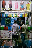 Stall with colorful drinks, Chowpatty Beach. Mumbai, Maharashtra, India
