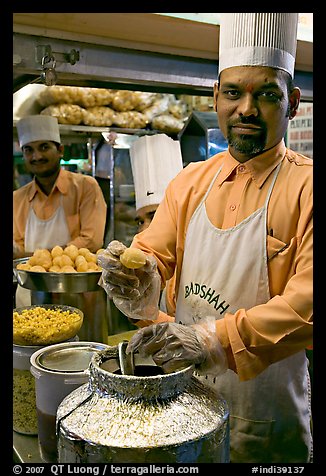Cooks in food stall, Chowpatty Beach. Mumbai, Maharashtra, India (color)