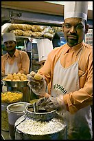 Cooks in food stall, Chowpatty Beach. Mumbai, Maharashtra, India (color)