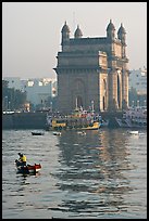 Small boat and Gateway of India, early morning. Mumbai, Maharashtra, India