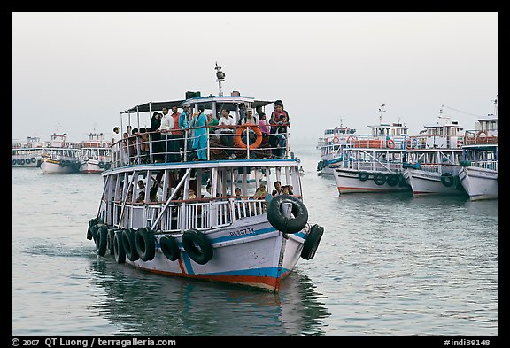 Tour boat loaded with passengers. Mumbai, Maharashtra, India