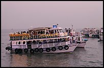 Tour boat at twilight. Mumbai, Maharashtra, India (color)