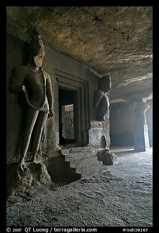 Figures of Dwarpala on Shiva shrine, Elephanta caves. Mumbai, Maharashtra, India