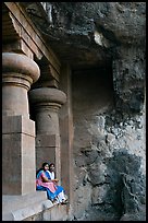 Women sitting at entrance of cave, Elephanta Island. Mumbai, Maharashtra, India (color)