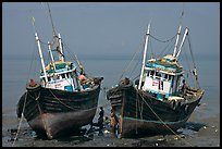 Boats at low tide. Mumbai, Maharashtra, India