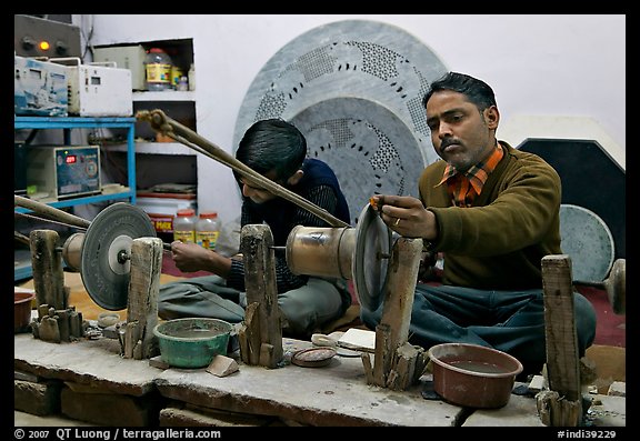 Men polishing marble. Agra, Uttar Pradesh, India