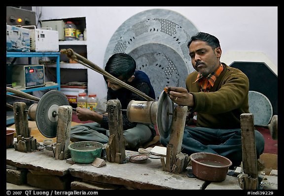 Men polishing marble. Agra, Uttar Pradesh, India