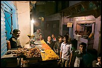 Street with vendor of sweets by night, Taj Ganj. Agra, Uttar Pradesh, India (color)