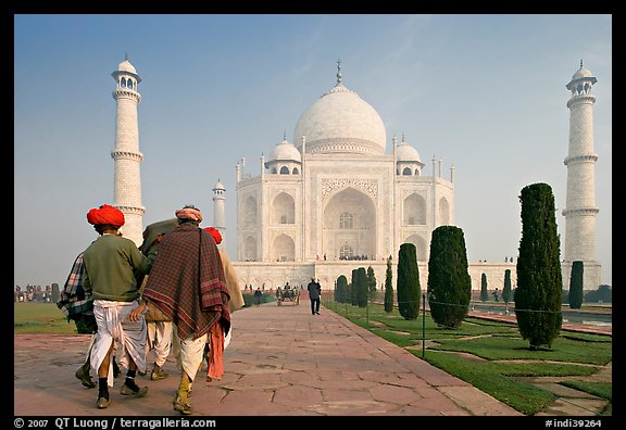Men walking toward Taj Mahal, early morning. Agra, Uttar Pradesh, India (color)
