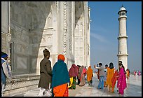 Colorful tourists on the platform, Taj Mahal,. Agra, Uttar Pradesh, India