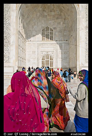 Women in front of main Iwan, Taj Mahal,. Agra, Uttar Pradesh, India (color)