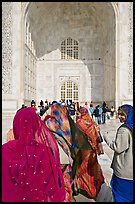 Women in front of main Iwan, Taj Mahal,. Agra, Uttar Pradesh, India