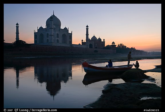 Boat on Yamuna River in front of Taj Mahal, sunset. Agra, Uttar Pradesh, India (color)