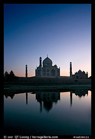 Taj Mahal reflected in  Yamuna River at sunset. Agra, Uttar Pradesh, India