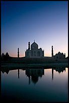 Taj Mahal reflected in  Yamuna River at sunset. Agra, Uttar Pradesh, India
