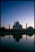 Taj Mahal reflected in  Yamuna River at sunset. Agra, Uttar Pradesh, India (color)