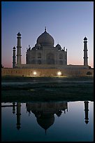 Taj Mahal over Yamuna River at dusk. Agra, Uttar Pradesh, India