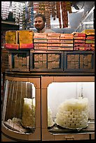 Store selling peitha squares, a local sweet. Agra, Uttar Pradesh, India (color)