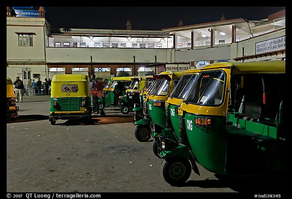 Auto-rickshaws in front of train station. Agra, Uttar Pradesh, India (color)