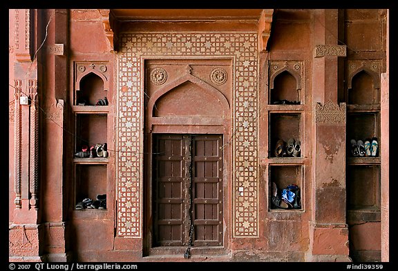 Wall with shoes stored, Dargah mosque. Fatehpur Sikri, Uttar Pradesh, India (color)