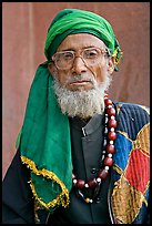 Elderly bespectacled man. Fatehpur Sikri, Uttar Pradesh, India