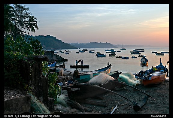 Fishing boats on beach, sunrise. Goa, India (color)