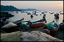 Fishing nets and boats, sunrise. Goa, India