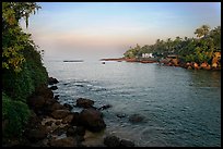 Oceanfront with house and palm trees, Dona Paula. Goa, India (color)