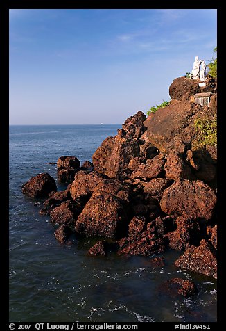 Boulders and christian statues overlooking ocean, Dona Paula. Goa, India (color)