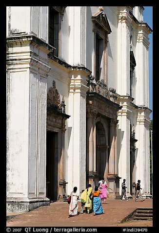 People at the entrance of Se Cathedral, Old Goa. Goa, India